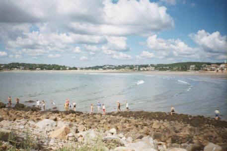 Folks wading through water at Salt Island.